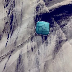 I’m selling a Teal necklace that would look cute with any attire!!